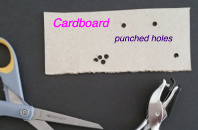 Card with holes punched