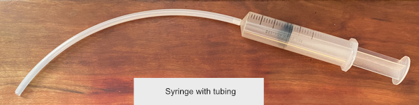 Syringe with tube