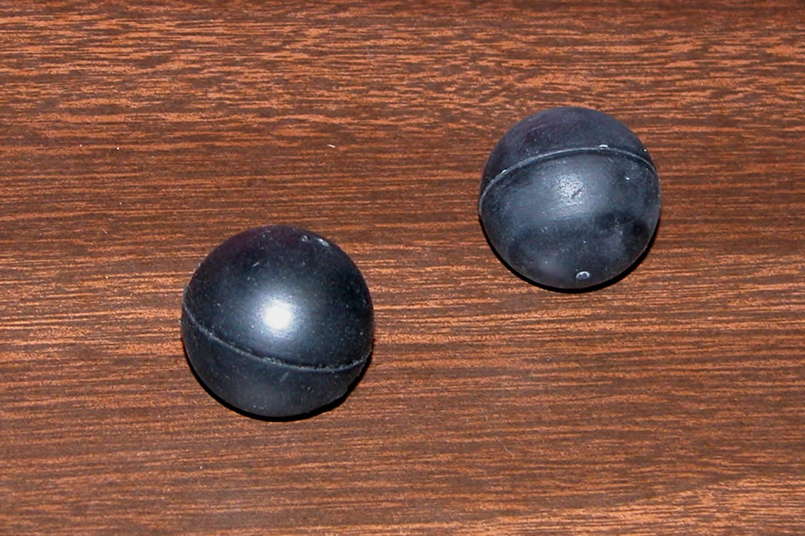 What makes them bounce differently? Bouncing black spheres